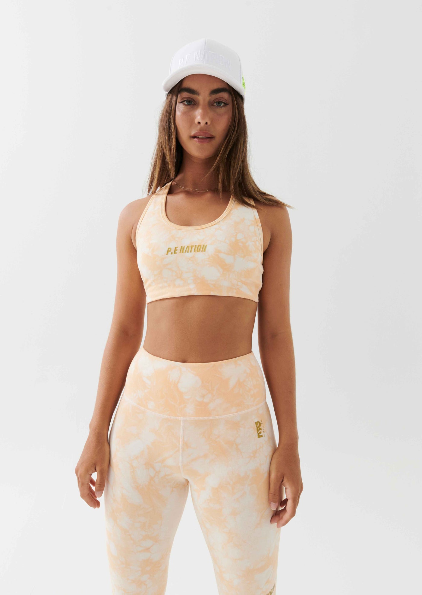 REACT SPORTS BRA IN GOLDEN SAND