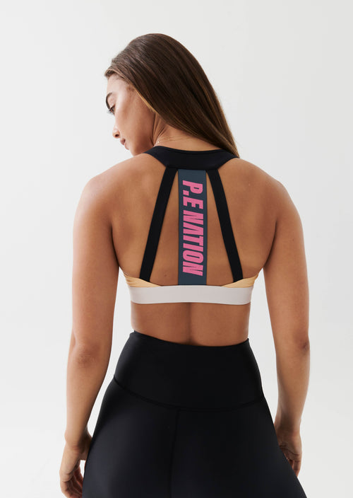 FRONTSIDE SPORTS BRA IN GOLDEN SAND
