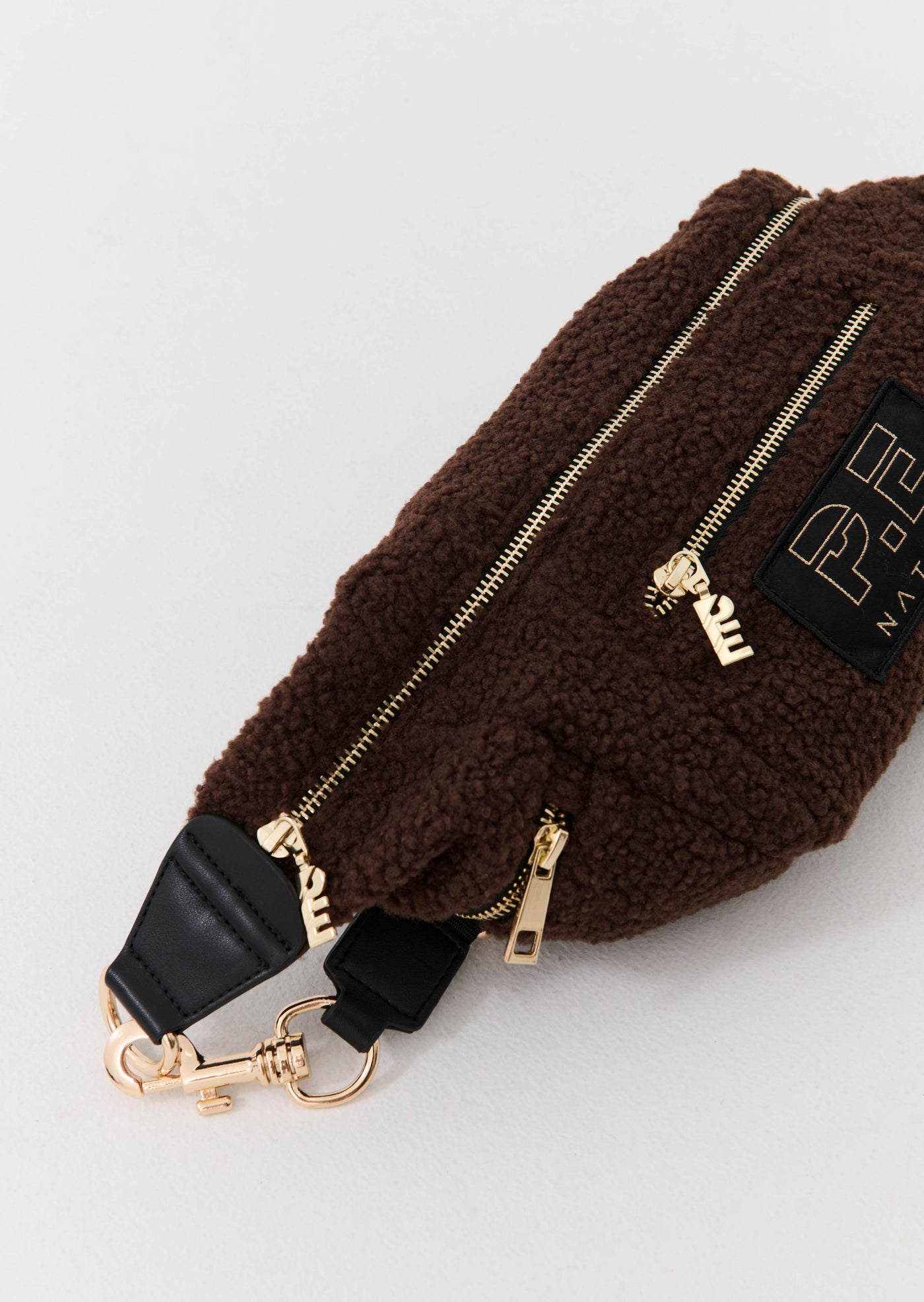 OPTIMUM CROSS BODY IN COFFEE BEAN