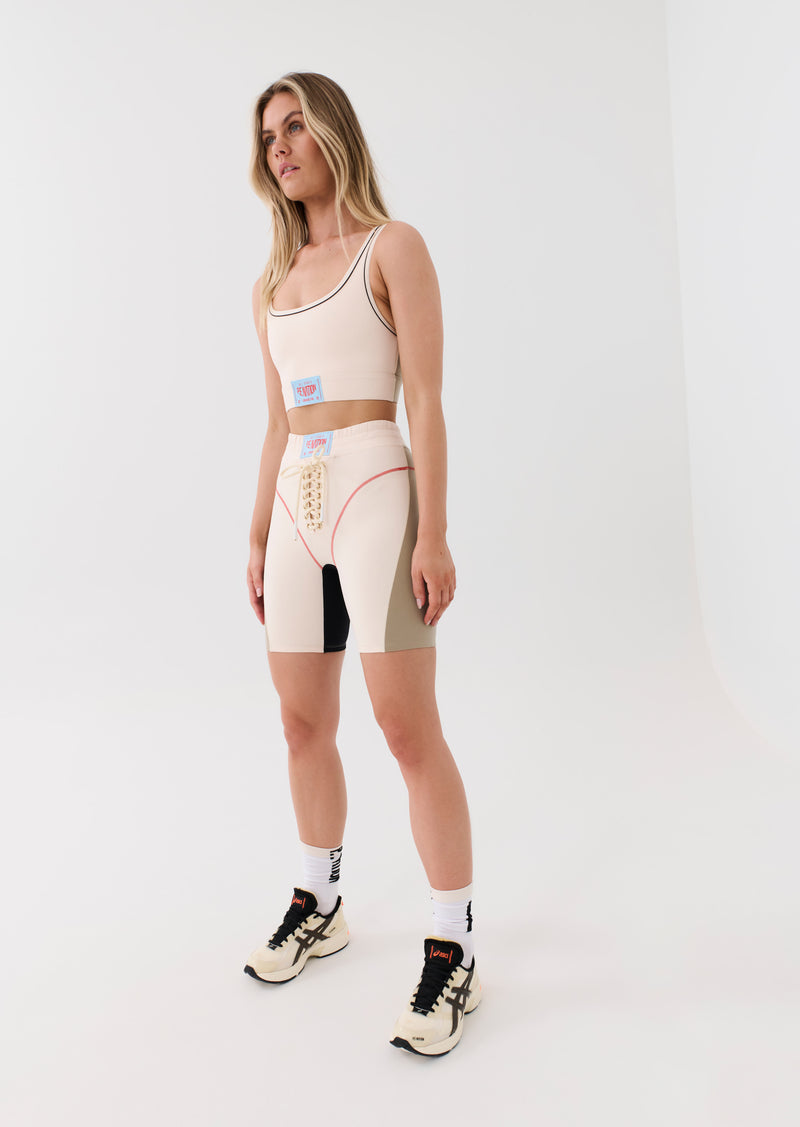 UNDEFEATED BIKE SHORT IN PEARLED IVORY