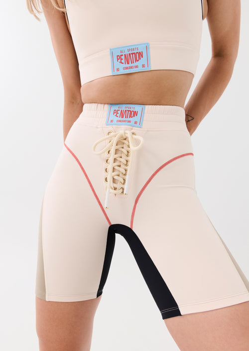 UNDEFEATED BIKE SHORT IN PEARLED IVORY