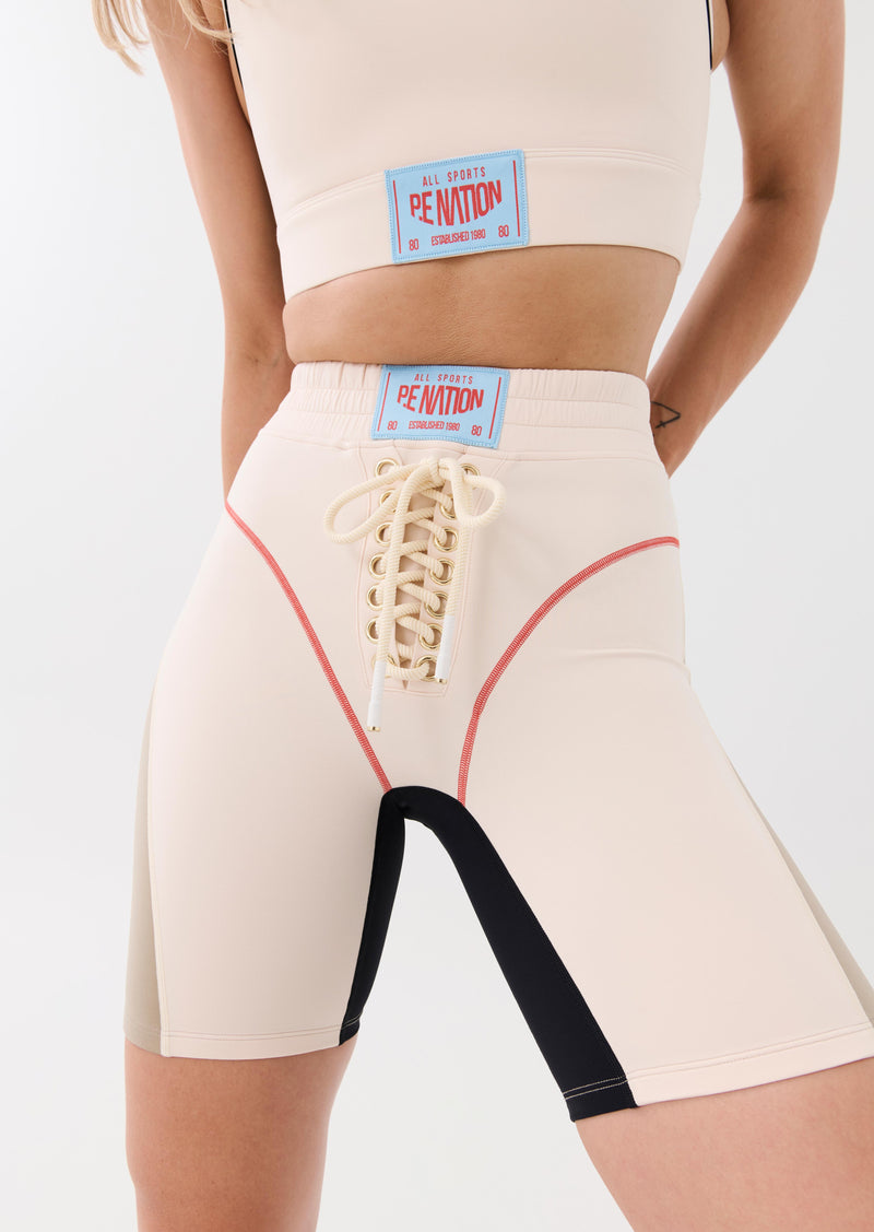 UNDEFEATED BIKE SHORT IN PEARLED IVORY