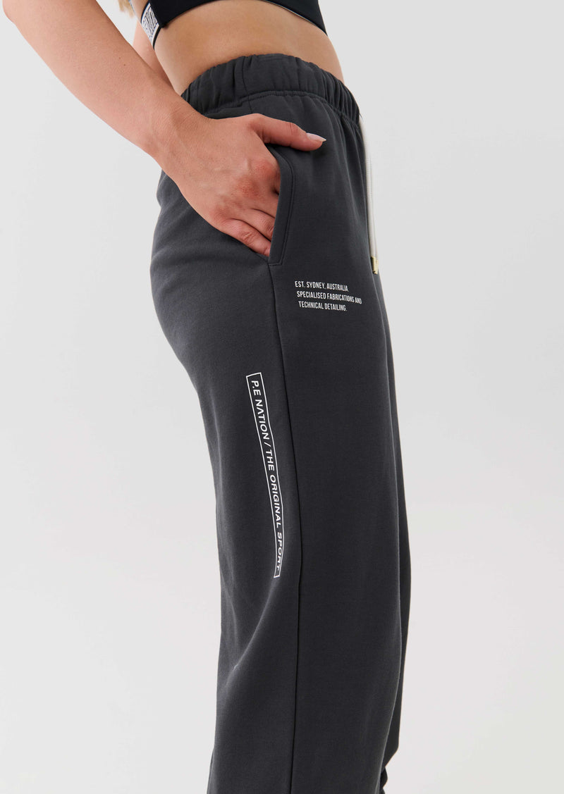 INITIATE TRACKPANT IN DARK SHADOW