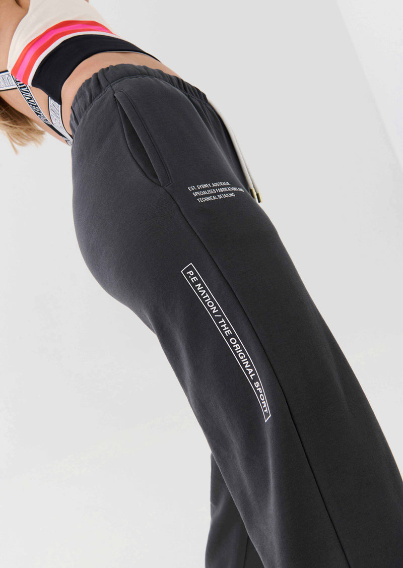 INITIATE TRACKPANT IN DARK SHADOW