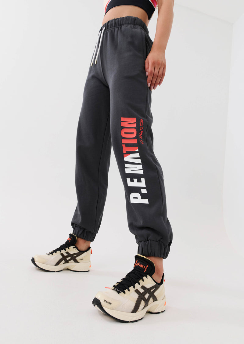 INITIATE TRACKPANT IN DARK SHADOW