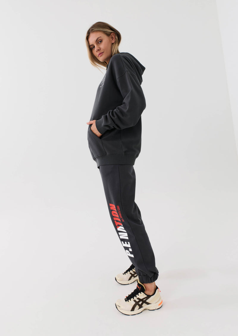 INITIATE TRACKPANT IN DARK SHADOW