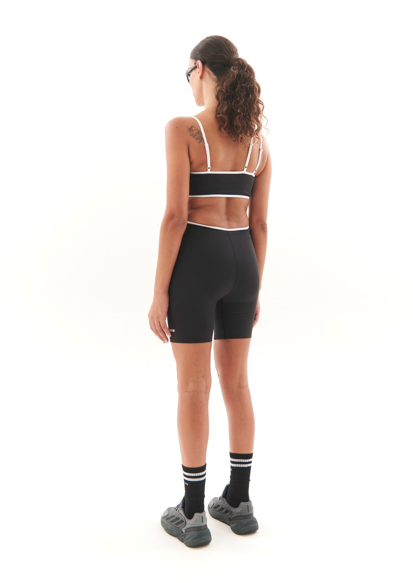PROGRESSION BODYSUIT IN BLACK