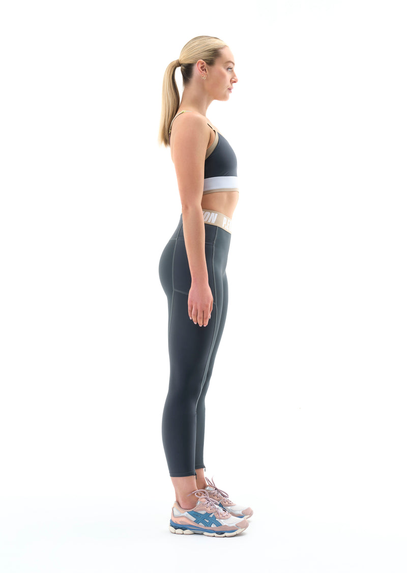TERRAIN SPORTS BRA IN DARK SHADOW